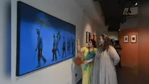 A blue-and-gold acrylic-on-canvas painting shows a wedding band returning after procession