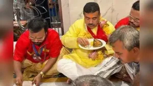 CM Suvendu Adhikari tucks into fish-and-pulao bhog at Kalighat temple on the occasion