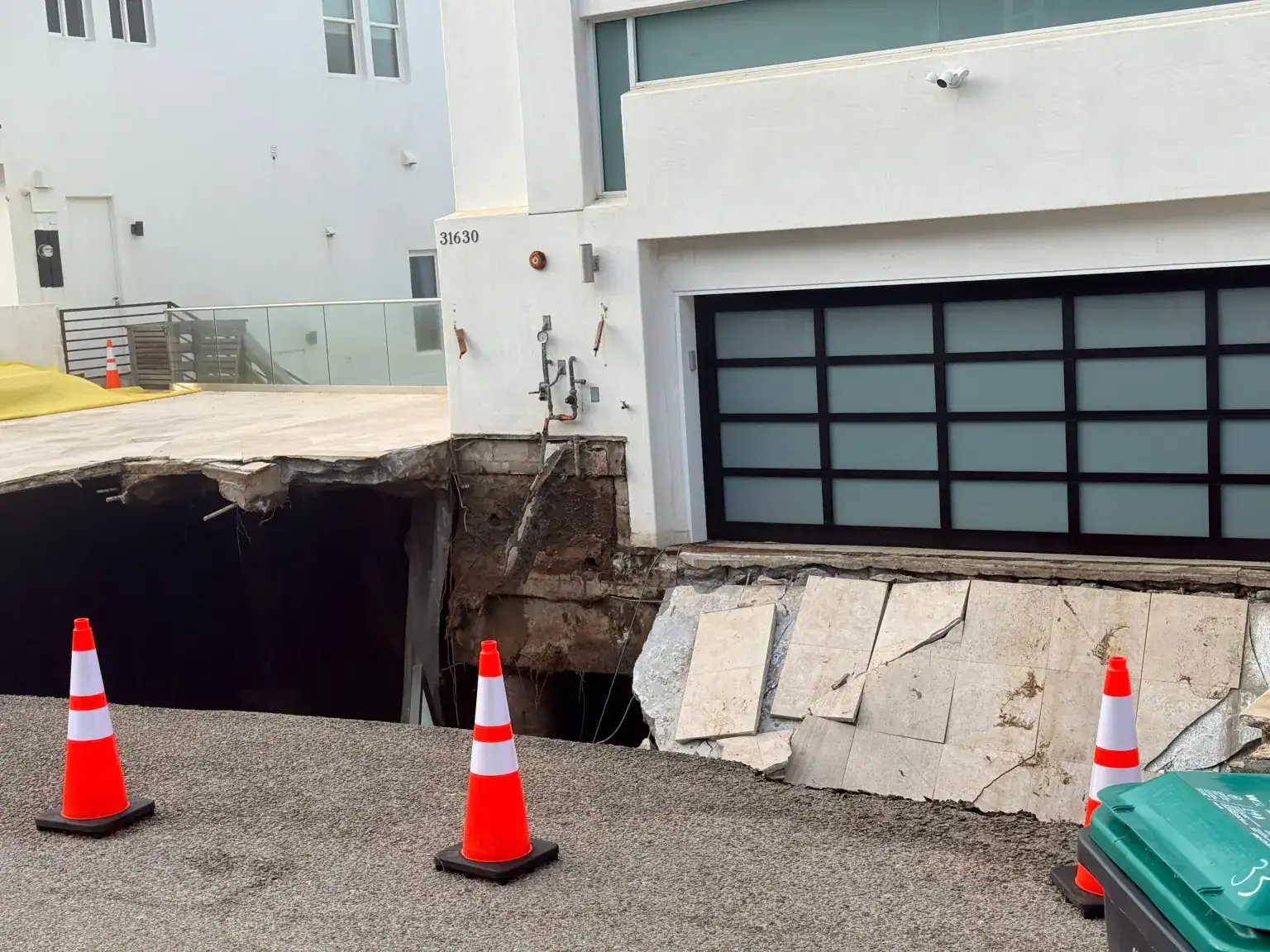Photos show a massive sinkhole opening outside Nicolas Cage’s $10.5 million Malibu mansion