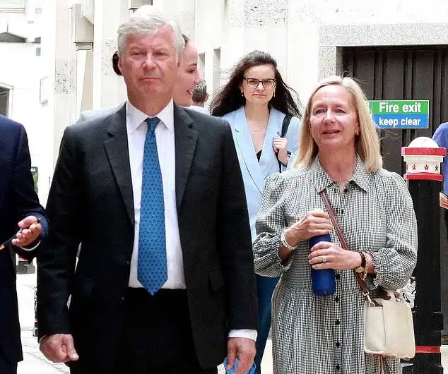 Parliament bell ringer Adrian Udal tore out a gate at his banker neighbour’s £2 million Fulham