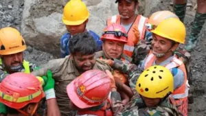 By 9.20am, two workers had been pulled out alive after nine days underground - the first such