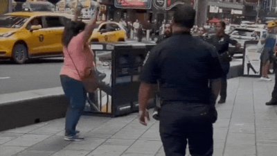 At least one person was killed and another critically injured after a woman allegedly stabbed