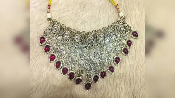 temple jewellery and antique finishes closely associated with South Indian brides, Polki