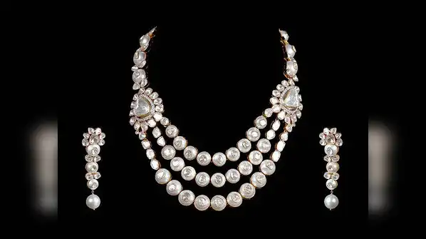 temple jewellery and antique finishes closely associated with South Indian brides, Polki
