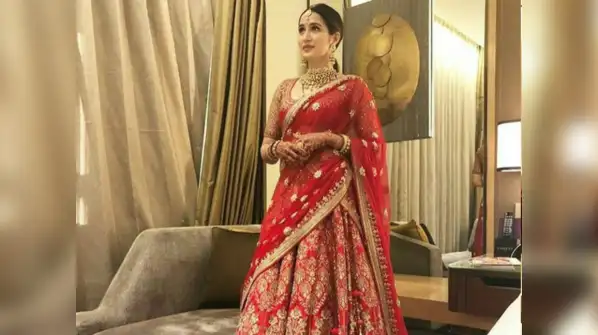 temple jewellery and antique finishes closely associated with South Indian brides, Polki