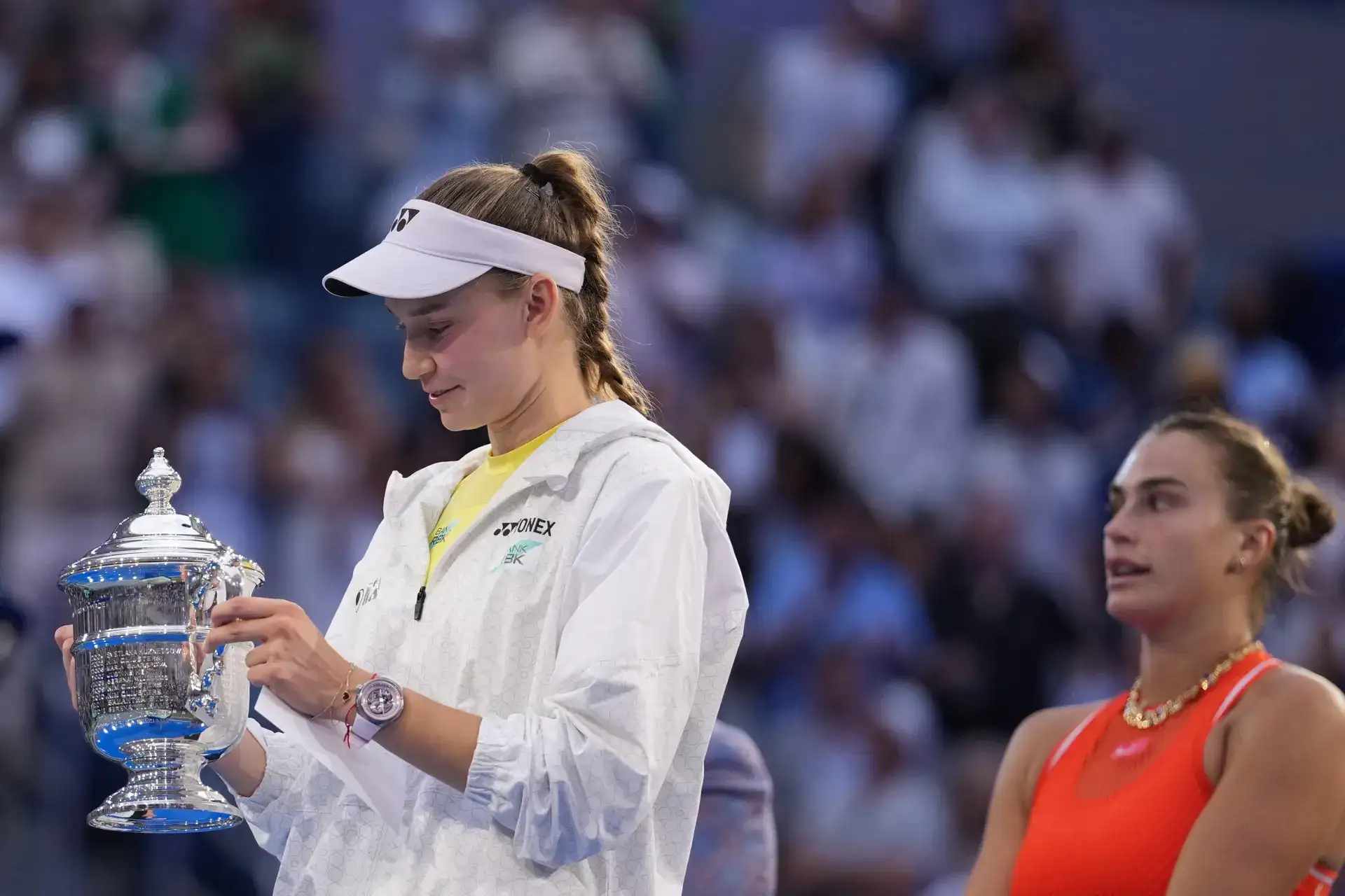 Elena Rybakina holds the trophy after she won the women's singles final of the US Open