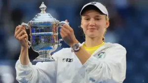 Elena Rybakina holds the trophy after she won the women's singles final of the US Open