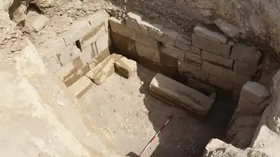 Archaeologists uncover 2,700-year-old Etruscan tomb at Italy's Vulci; weapons, gold and rare