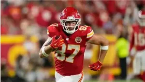 Travis Kelce added another unusual entry to his NFL résumé on Sunday, moving past Marshall