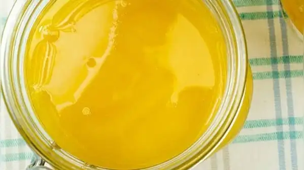 Ghee naturally solidifies as temperatures drop, it's simply how the fat behaves in the cold
