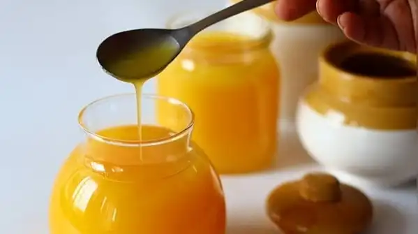 Ghee naturally solidifies as temperatures drop, it's simply how the fat behaves in the cold