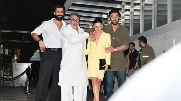 This time, the actor stepped out in a soft butter-yellow vintage Givenchy look, but it was