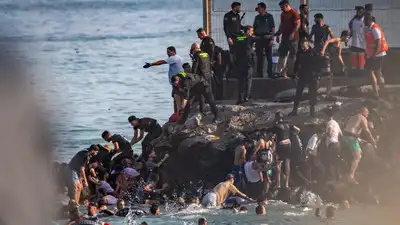 Spain's intelligence and security agencies had warned of mass migration into the Spanish enclave