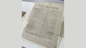 A volunteer sorting old Royal Navy papers found a rare 1776 US Declaration of Independence copy; it