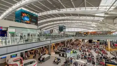 Train services at Heathrow Airport were suspended after a grass fire beside the railway