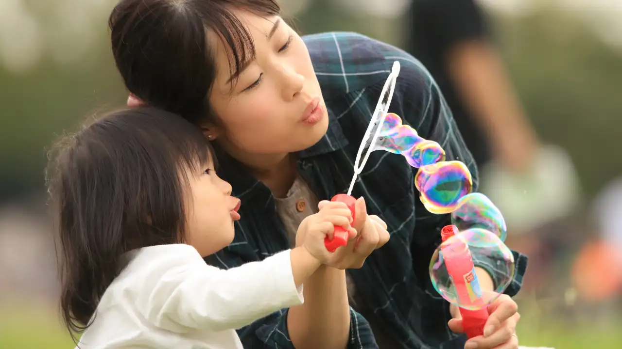 Parents with two daughters are among the world's happiest, argues new study