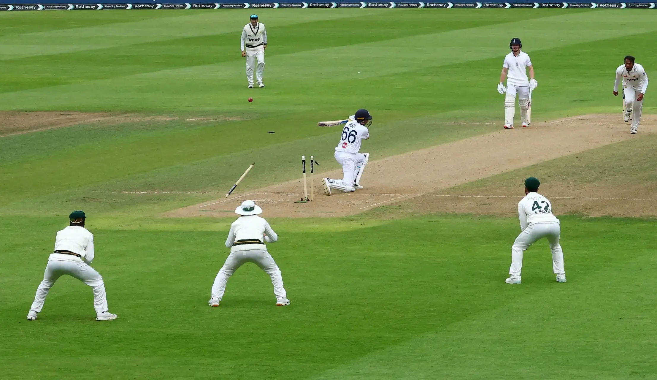 England's opener Emilio Gay reacts after hitting his knee with his bat during the third Test vs