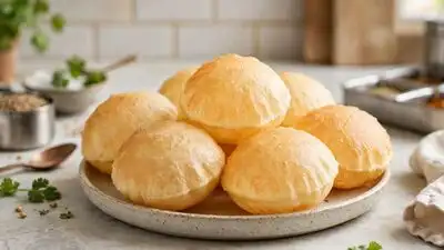Because a soft dough can make puris absorb more oil during frying, a firm dough is important