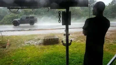 Tropical depression Edouard brings floods to Texas; knocks out power for thousands