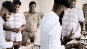 Six policemen faced suspension after a video showed a civilian cutting a cake