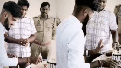 Six policemen faced suspension after a video showed a civilian cutting a cake