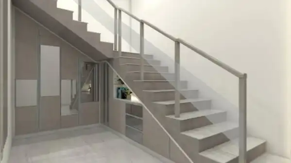 Here's how to turn the space under your stairs into a reading nook, a pantry, or even a small