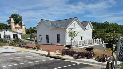 CBS Atlanta reported in March 2026 that a new hotel was being developed on the original lot