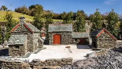 In England, a retired man spent 30 years building a slate miniature Lake District village, then