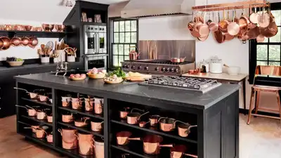 From combining five rooms into one large kitchen to keeping a separate outdoor cooking space