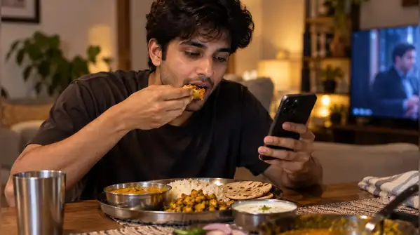 the research does not suggest that watching something while eating automatically makes you