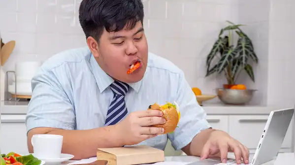 the research does not suggest that watching something while eating automatically makes you