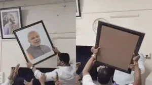 A political row erupted over the removal of Prime Minister Modi's photograph by MNS workers