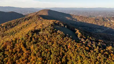 North Carolina acquired more than 342 acres without using local purchase money; the mountain