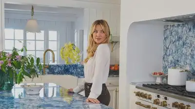As shown on Instagram, Kate’s kitchen has the famous Blue Cristello marble along with creamy