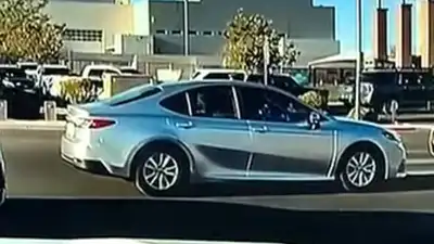 A Las Vegas crossing guard steps in front of speeding car as it bears down on mother, 2 children