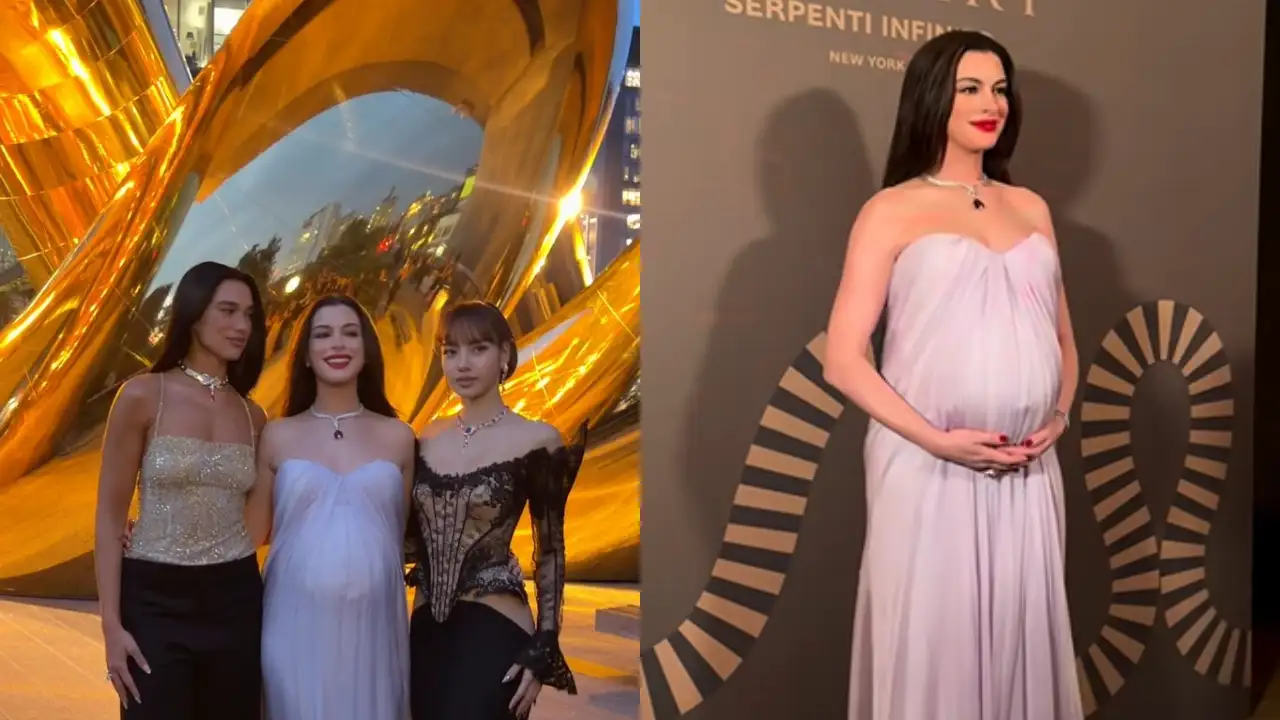 Dressed in an exaggerated Alexander McQueen gown that could be held together by nothing but