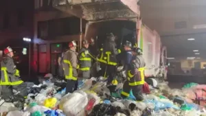 A San Francisco bystander heard screams from a garbage truck after its load had been compacted; 25
