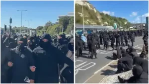 Groups of masked men blocked roads leading to Britain’s busiest ferry port in Dover on Saturday