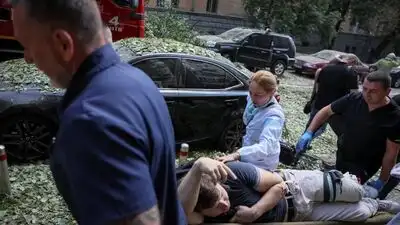 Russian airstrikes hit apartment buildings and civilian infrastructure in Ukraine’s Kyiv