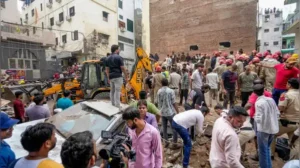 At least one person died after a building collapsed near Delhi’s Satya Niketan area on Sunday