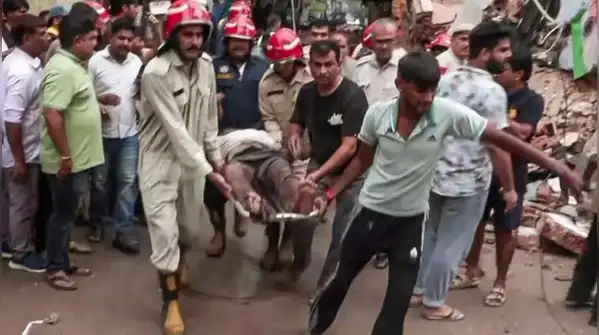 At least one person died after a building collapsed near Delhi’s Satya Niketan area on Sunday