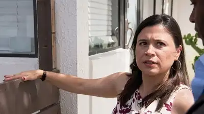 Five years after the purchase, Martinez confronts the threat of foreclosure over a $55,650 code