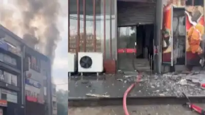 Around 30 people were rescued after a fire broke out in a three-storey building housing