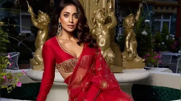 Shriya Saran made the classic red saree more romantic by combining its distinct draping grace