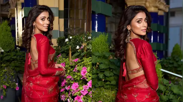 Shriya Saran made the classic red saree more romantic by combining its distinct draping grace