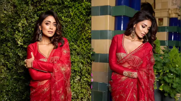 Shriya Saran made the classic red saree more romantic by combining its distinct draping grace