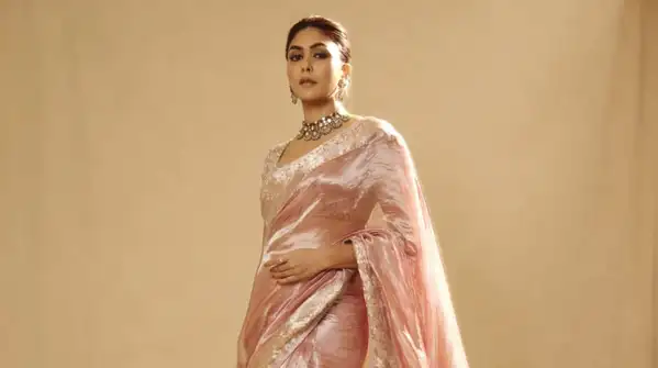 Wearing a magnificent pink saree, the actress combined the classic trio of statement jewellery