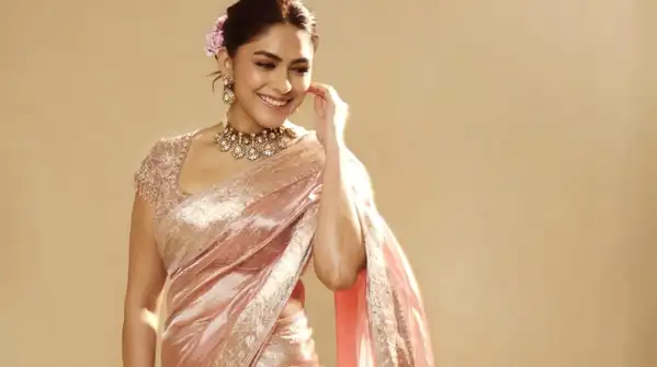 Wearing a magnificent pink saree, the actress combined the classic trio of statement jewellery