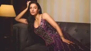 Wearing a stunning purple lehenga designed by Punit Balana, the actress turned in an outfit