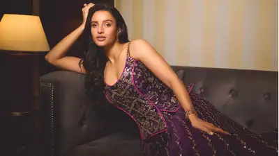 Wearing a stunning purple lehenga designed by Punit Balana, the actress turned in an outfit